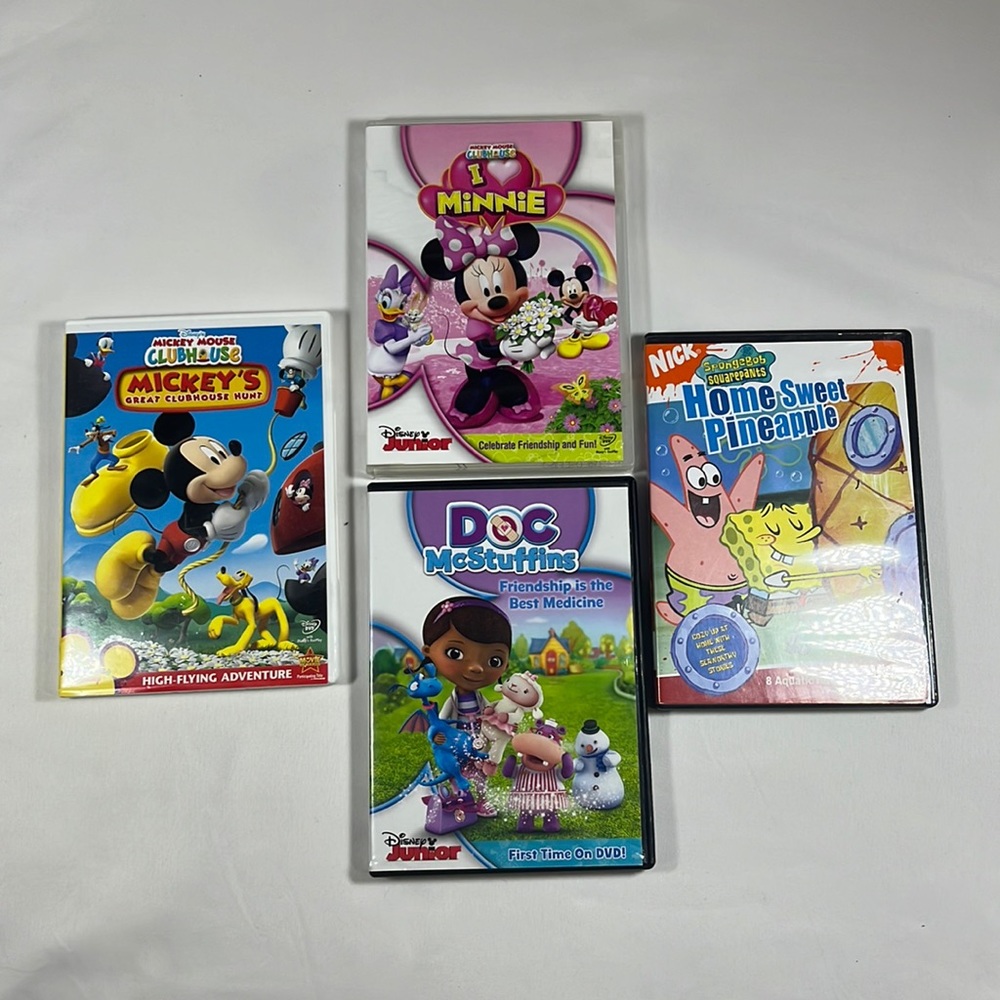 2 Disney Mickey and Minnie Mouse 1 SpongeBob and 1 doc mcstuffins DVD Discs.